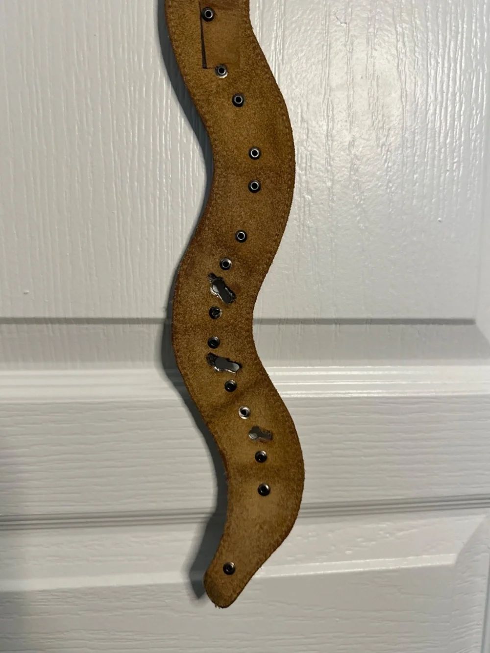 Vintage brown leather and silver colored metal articulated snake belt